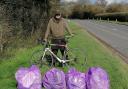 Thomas Collingwood with just a fraction of the bags he's filled as he clears litter from the verges on the A465 between Hereford and the Welsh border at Llangua