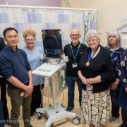 The donated ultrasound scanner surrounded by staff from the Urology Intervention Centre at the Alexandra Hospital and members of the League of Friends