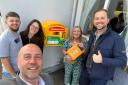 Cllr Wayne Little, Stuart Ross, Ruby Anne Queen, Nicola Preston and Cllr Adam Davies with the new Tenth Lock defibrillator
