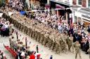 EYES TO THE RIGHT: More than 800 homecoming troops parade through the streets of Worcester watched by huge crowds. Photograph by Jonathan Barry. 26072712