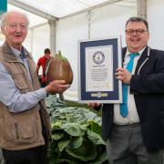 PICTURED: Guinness World Record for Peter Glazeborrk, Heaviest Aubergine.   with Craig Glenday from Guinness.   Three Counties Malvern Autumn Show . Photos by Anna Lythgoe 24.09.21.