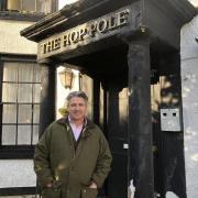 Alfie Best outside the Hop Pole Hotel in Bromyard's Market Square