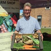 Farmer John Davenport with his vegetables
