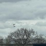 Pictured: three of the four helicopters flying over Hereford