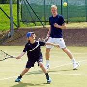 Playing at Ledbury Tennis club