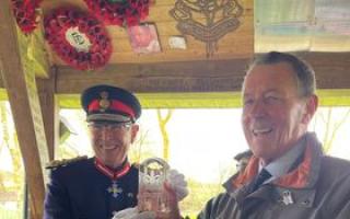 Mike Colton (right) receives the Kings Award from Admiral Sir Trevor Soar