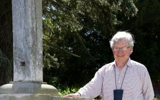 2715901003 Paul Jackson 30.06.15 Putley - Tim Beaumont with the war memorial at Putley Church which has been restored and a new name carved into it. (30604761)