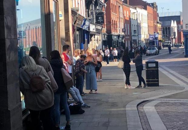 Ledbury Reporter: People queuing in Widemarsh Street to get into Primark. Picture: Ben Goddard