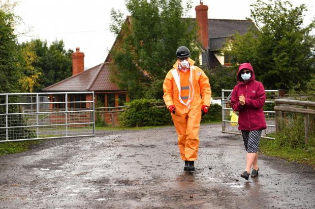 Ledbury Reporter: Karen Wright , right, Director of Public Health for Herefordshire, at the farm. Picture: Ben Birchall/PA Wire