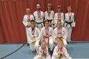 Hereford Taekwondo club members who came away with a host of medals from a competition in Nottingham