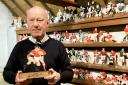 John Wilesmith, from Ledbury, is selling his signed set of 1,000 handcrafted wooden models of the game's top players. Picture: John Wilesmith/SWNS