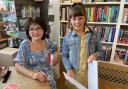 Suzan Alderton with young reader Nanci Brown