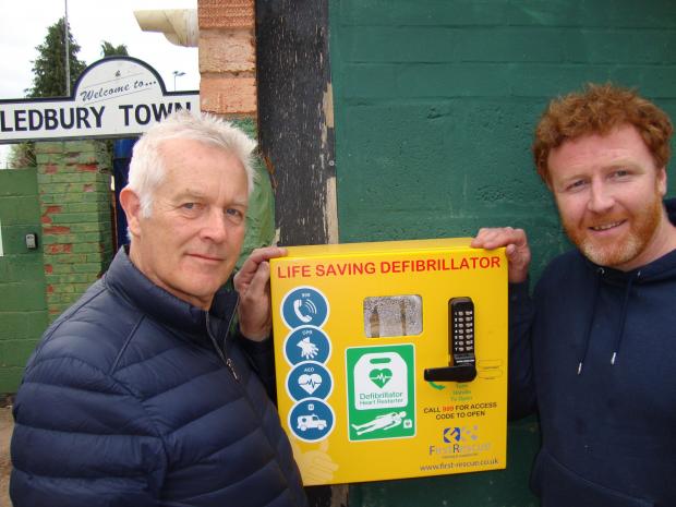 Ledbury Reporter: Ledbury Town chairman Peter Boyle (right) and Brian Jenkins with the new defibrillator