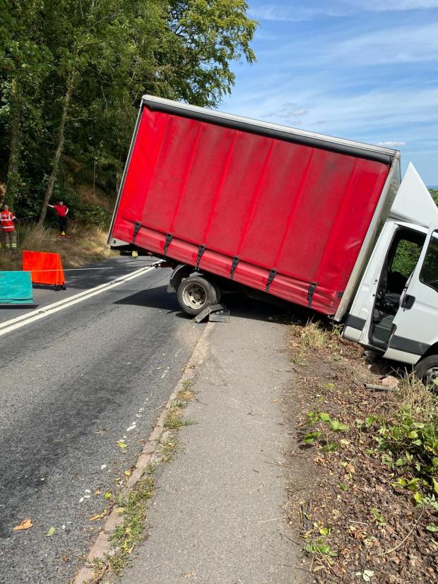 Ledbury Reporter: DRAMATIC: The lorry was in a precarious position but fire crews were on hand to help. Photo: Ledbury Fire Station 