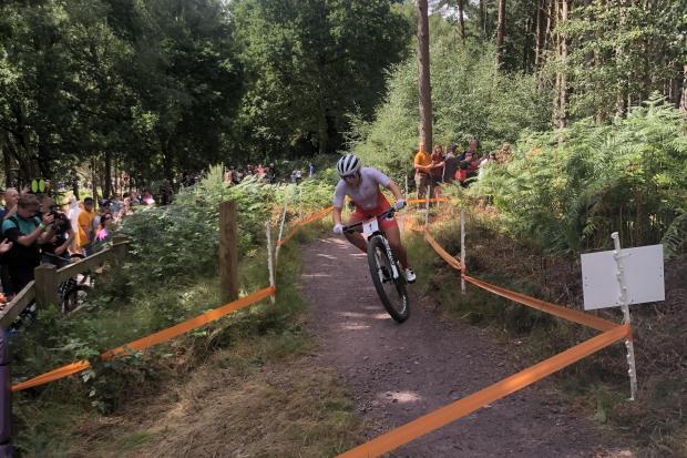 GOLD: Evie Richards wins the Cross-Country Mountain Bike at the Commonwealth Games.