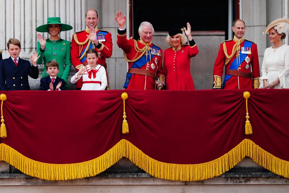 King thanks Trooping crowds from palace balcony as young Louis plays up – again