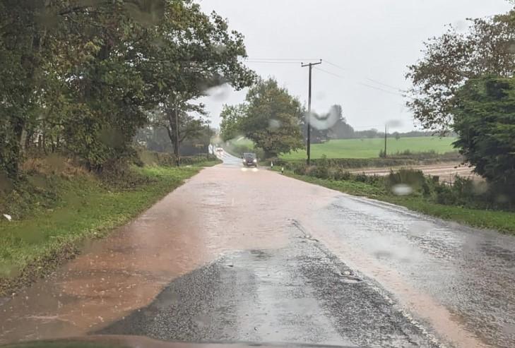Heavy rain floods Herefordshire roads with alerts issued 