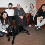 Smudge, the dog who was rescued from the river Wye by anglers after two days missing, is back at home with his family. Picture: Rob Davies