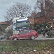 A crash between a car and a lorry partially blocked the A49 in Hereford city centre