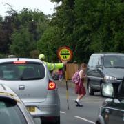Parents may longer be allowed to drop off and pick up their children from school by car.