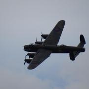 The BBMF Lancaster Bomber performing its three flypasts over Munsley Church, where Tony and his wife are buried