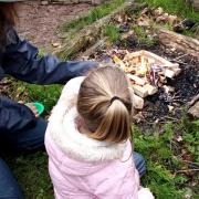 Cooking on fire in Fun in the Forest
