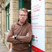 Postmaster Tim Allen has hit out at Government plans for DVLA services