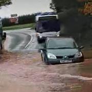 Heavy rain flooded the A465 Hereford to Bromyard road