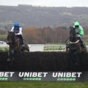Cepage ridden by Charlie Deutsch (left) jumps the last before winning the Unibet Middle Distance Chase Series Veterans' Handicap Chase during day one of the The Christmas Meeting at Cheltenham Racecourse