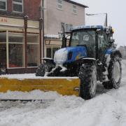 A tractor clearing snow in Kington's High Street in 2017. Picture: Andy Compton