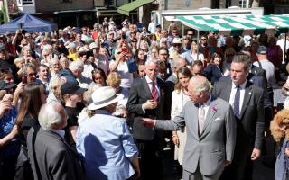 The Prince of Wales meets with members of the public during a visit to Hay Castle in Hay-on-Wye, Powys. Picture: 
Chris Jackson/PA Wire.